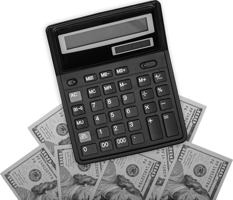 011 calculator laptop and dollar bills on colored back GBGGL83