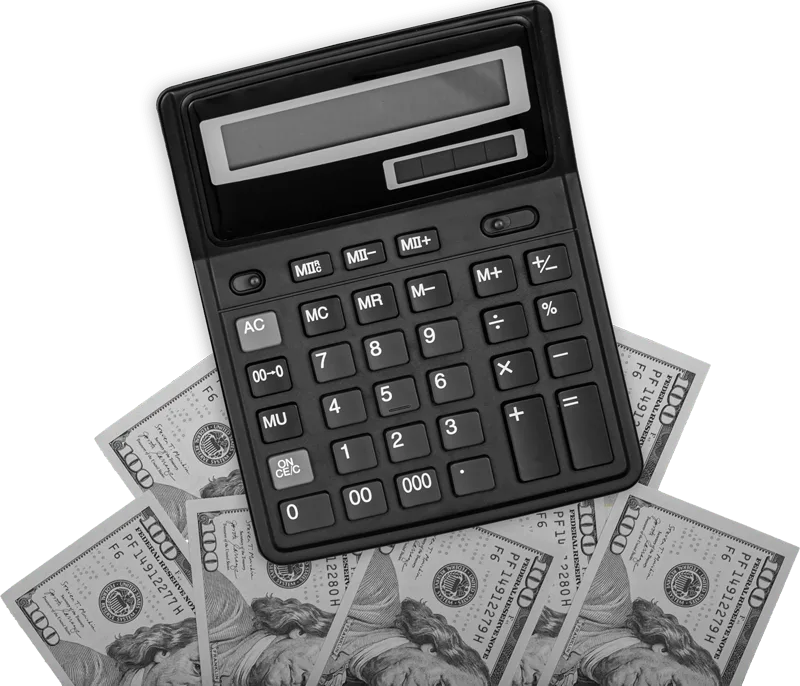 011 calculator laptop and dollar bills on colored back GBGGL83